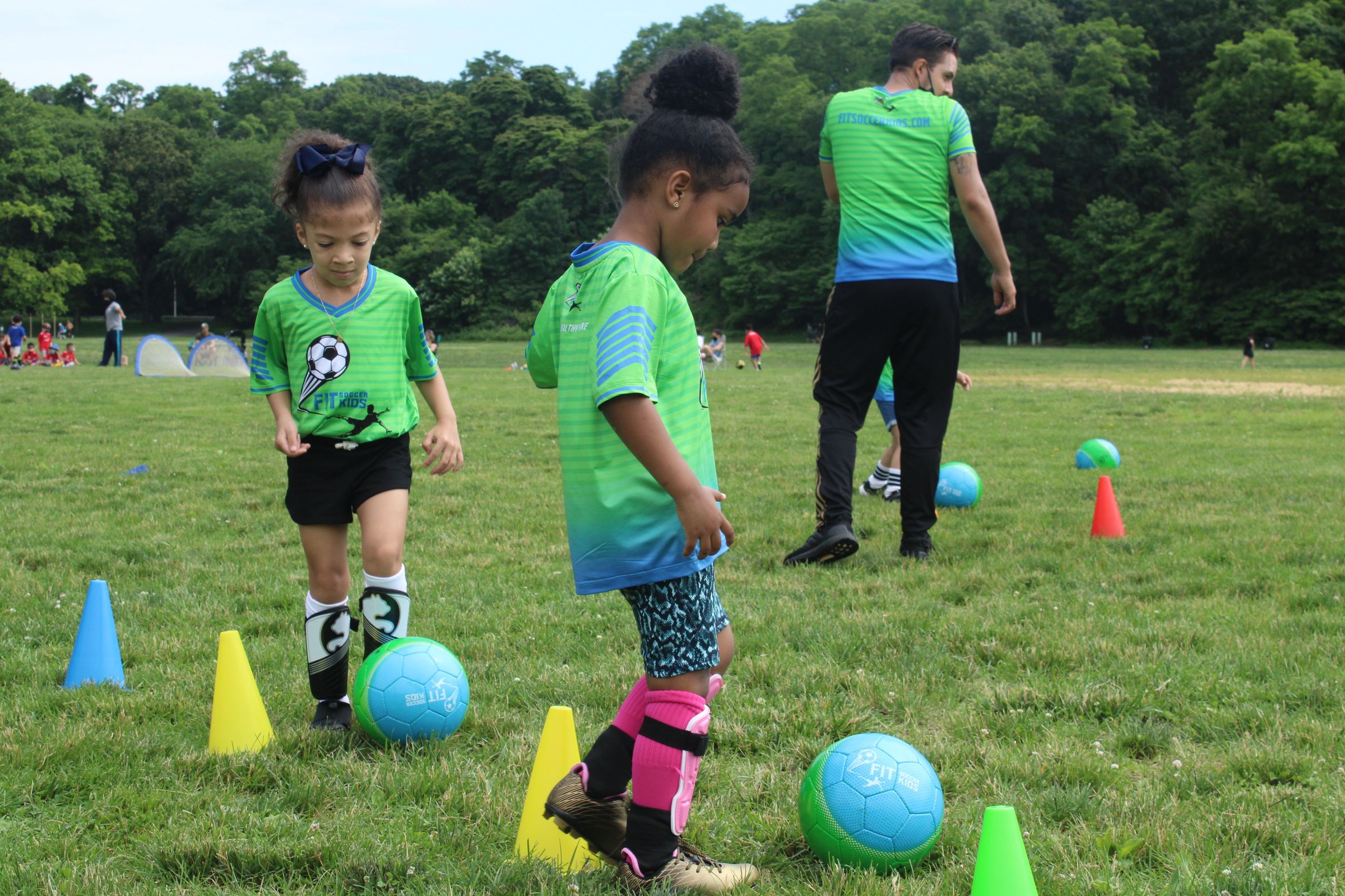 Young Fit Soccer Kids player running during a soccer drill in the Bronx