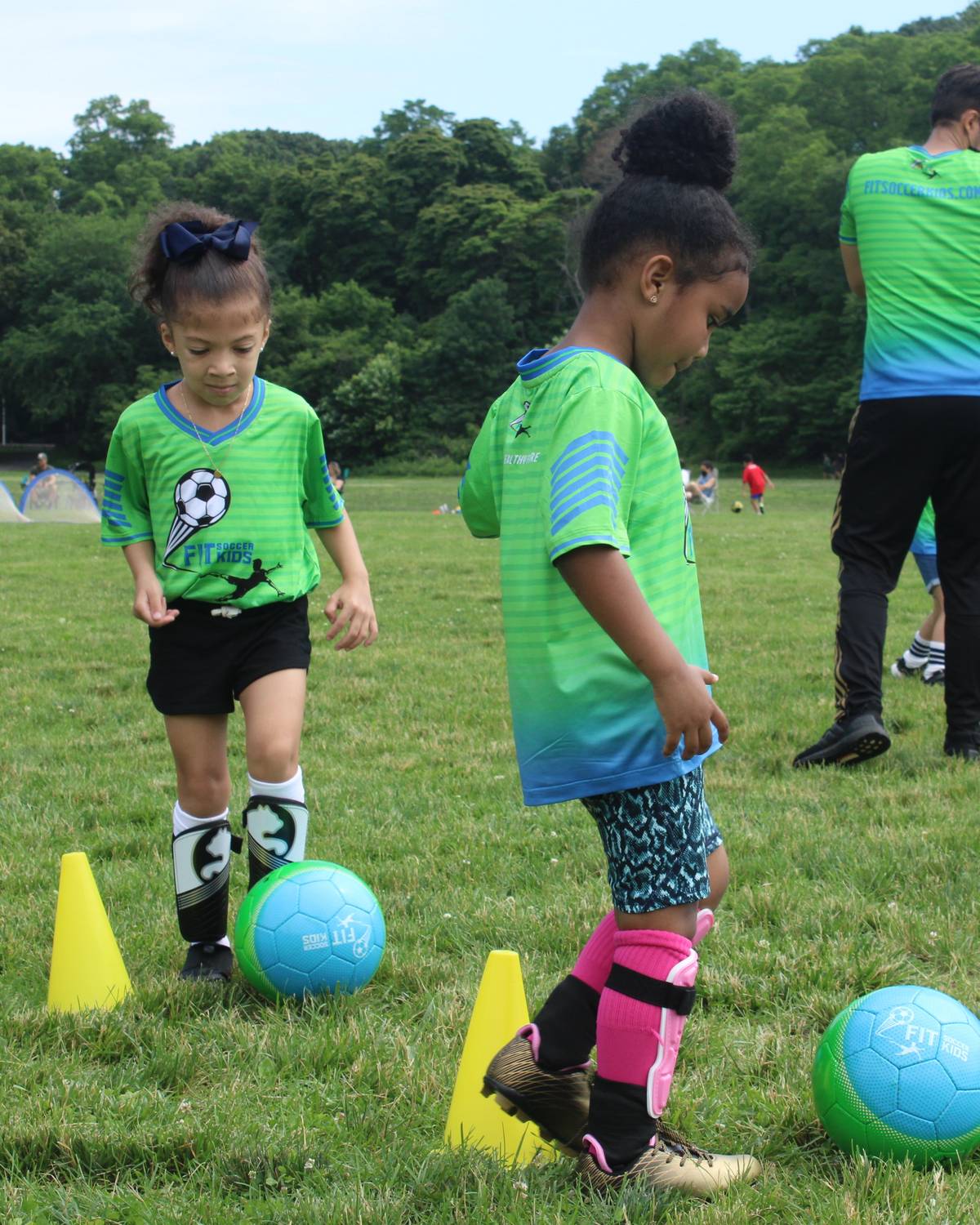 Young Fit Soccer Kids player running during a soccer drill in the Bronx
