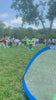 Fit Soccer Kids coaches leading a youth soccer class outdoors in the Bronx